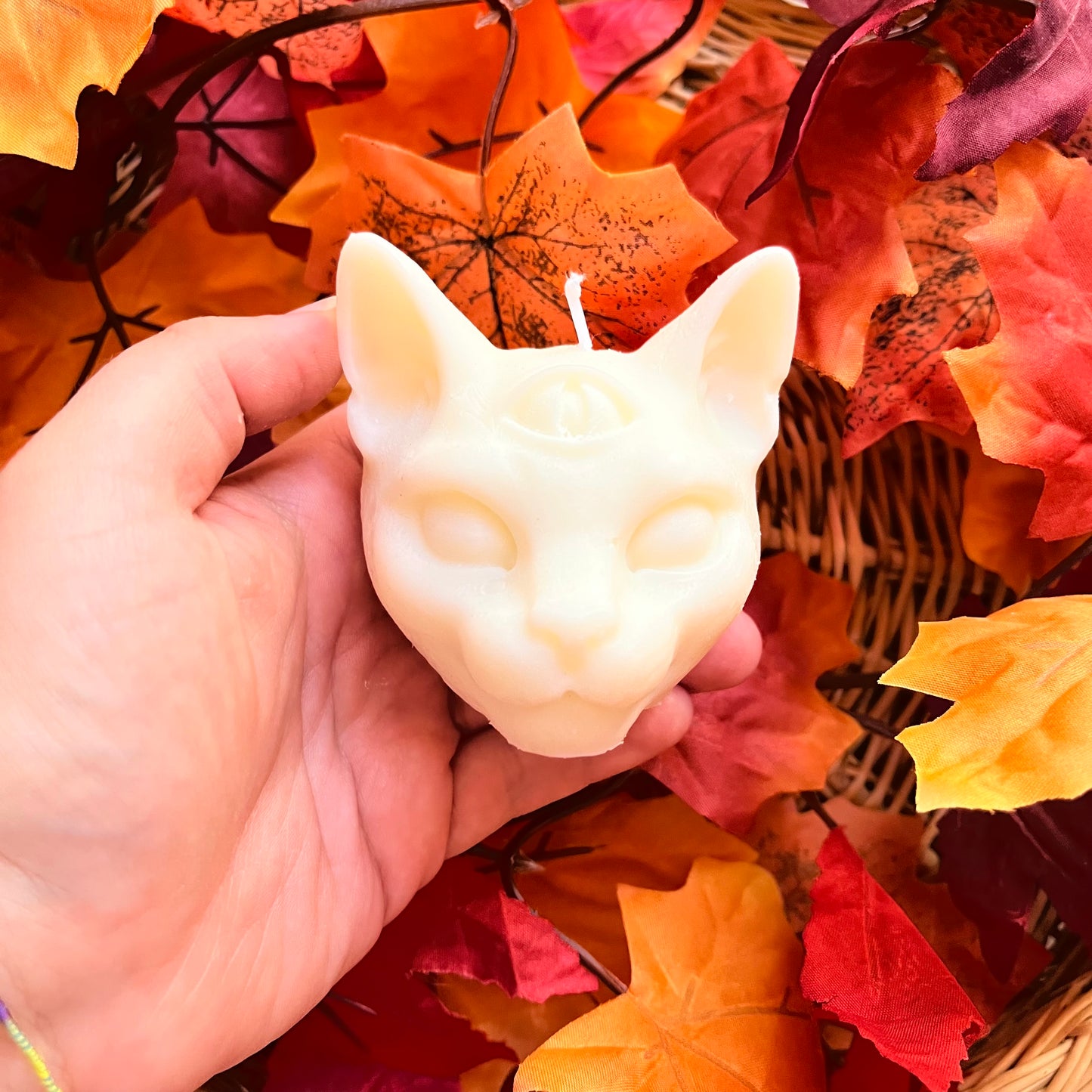Candela a forma di gatto con terzo occhio