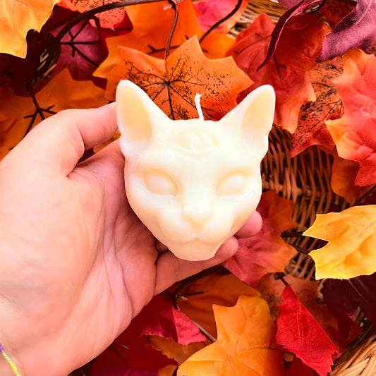 Candela a forma di gatto con terzo occhio