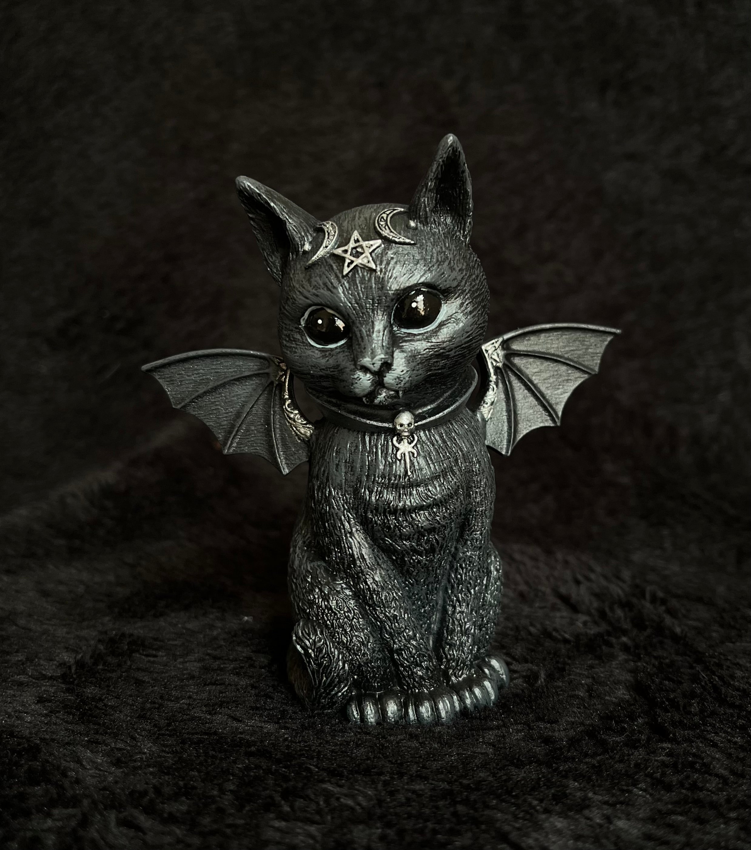 Malpuss statuetta